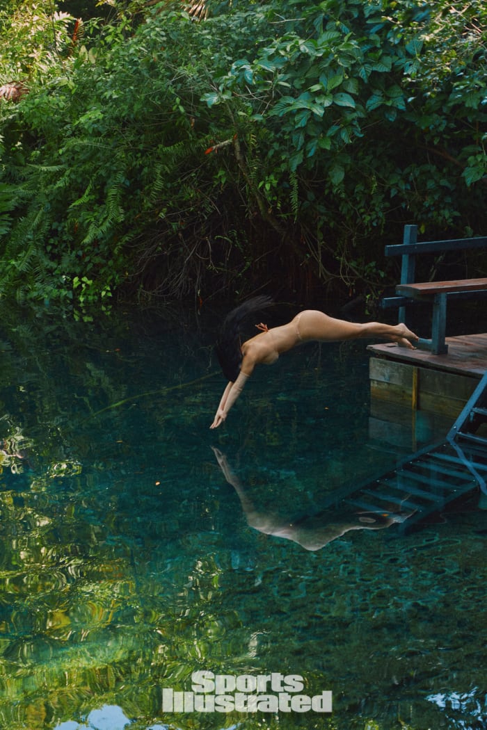 Kim Kardashian was photographed by Greg Swales in the Dominican Republic. Swimsuit by SKIMS. Gloves by SKIMS.